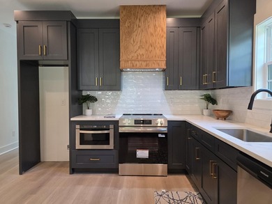 NOW COMPLETE & MOVE-IN READY -- INCLUDING REFRIGERATOR, WASHER & - photo 13
