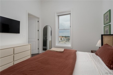 Welcome to Unit 700 at The Alston, an impressive 3-bedroom