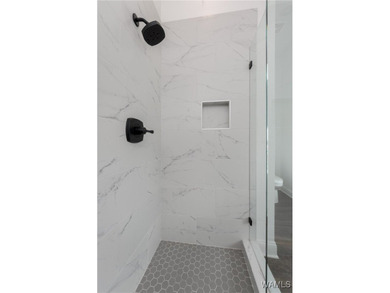 Welcome to Unit 700 at The Alston, an impressive 3-bedroom