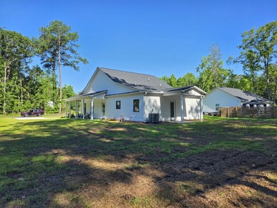 NOW COMPLETE & MOVE-IN READY -- INCLUDING REFRIGERATOR, WASHER & - photo 39