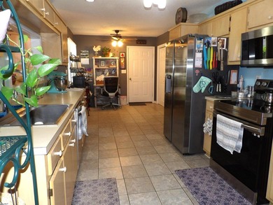 Wake up each morning to beautiful pond and golf course views - photo 8