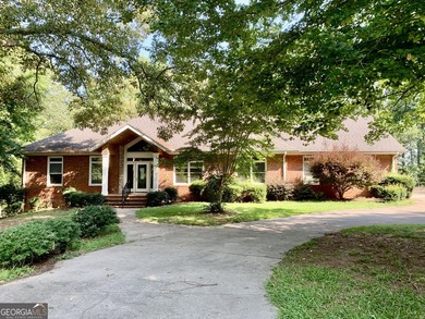 Elegant Lakefront Home with Exceptional Views and Amenities - photo 1
