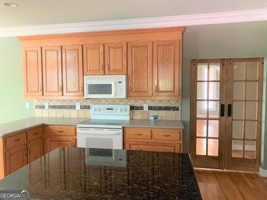 Elegant Lakefront Home with Exceptional Views and Amenities - photo 7