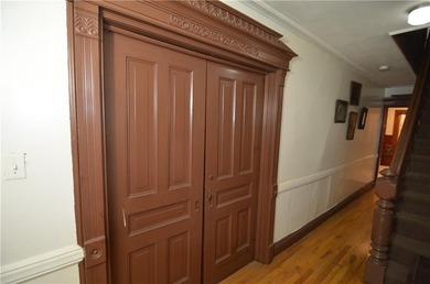 Welcome to this charming three-family brownstone, ideally - photo 4