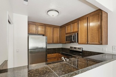 Stunning condo located in one of the most desirable locations in - photo 11