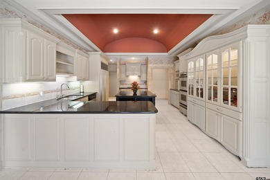 Welcome to 7402 Hollytree Dr., an exceptional estate situated on - photo 12
