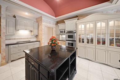 Welcome to 7402 Hollytree Dr., an exceptional estate situated on - photo 13