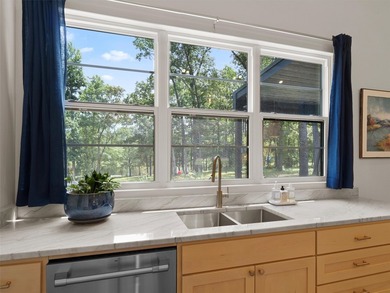 Experience peaceful waterfront living at this beautifully - photo 18