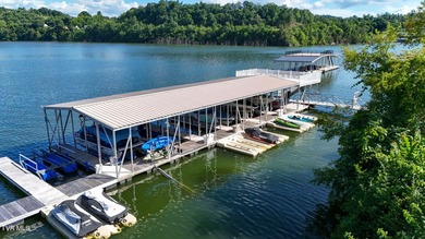 Perched along the sparkling shoreline of Boone Lake, this - photo 3