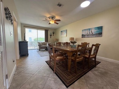 This fully furnished ground floor condo has tile floor and - photo 7