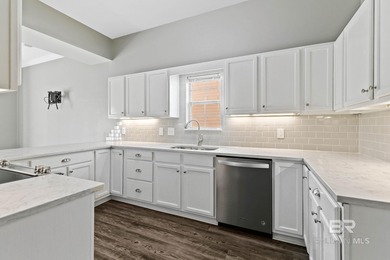 This stunning condo in Sunset Bay Villas offers a