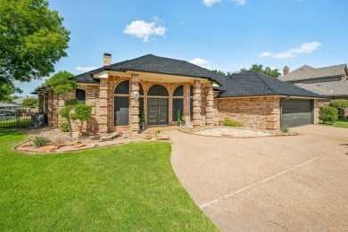 Welcome to this impeccable lakefront home where modern style - Lake Home For Sale in Granbury, Texas