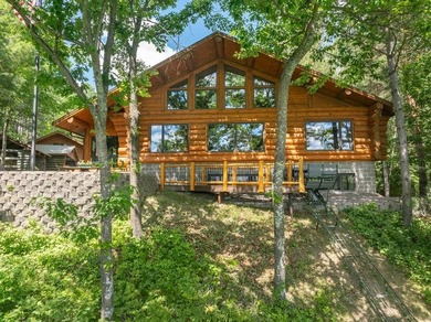 Set on 193 feet of private Bluewater Lake shoreline with - photo 1