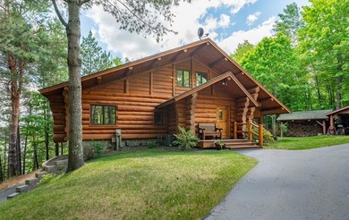 Set on 193 feet of private Bluewater Lake shoreline with - photo 2