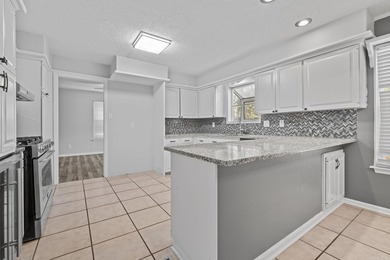Beautifully updated 4-bedroom, 2.5-bath home offering the - photo 12
