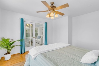 This charming waterfront home offers 275' of shoreline plus a - photo 18