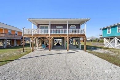 Welcome to the Playful Pelican! This 2BR/2BA raised beach - photo 3