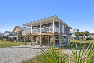Welcome to the Playful Pelican! This 2BR/2BA raised beach - photo 5