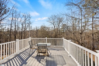 Set on 3.55 waterfront acres, this one-level custom home offers