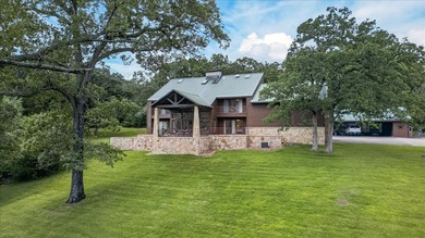 Tucked beneath a canopy of mature hardwoods on 10.08 secluded - photo 1