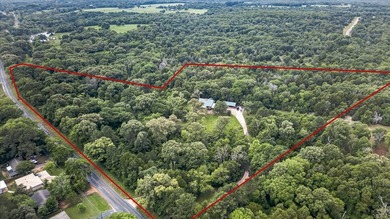 Tucked beneath a canopy of mature hardwoods on 10.08 secluded - photo 3