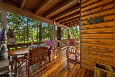 Tucked away in the tall pines of Pineridge, this beautifully