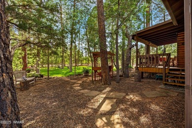 Tucked away in the tall pines of Pineridge, this beautifully