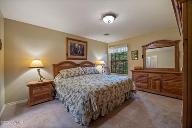 Tucked away in the tall pines of Pineridge, this beautifully