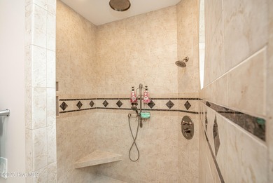 Hidden gem on a maturely landscaped & private .40/acre home site