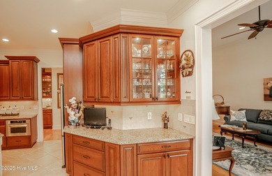 Hidden gem on a maturely landscaped & private .40/acre home site