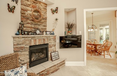 Hidden gem on a maturely landscaped & private .40/acre home site