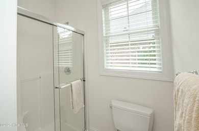 Hidden gem on a maturely landscaped & private .40/acre home site