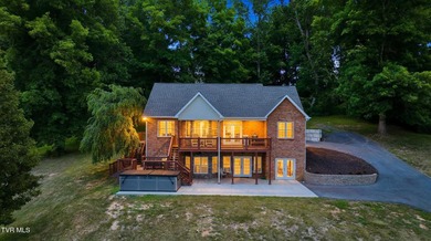 Luxury lake living meets breathtaking mountain views in this - photo 1