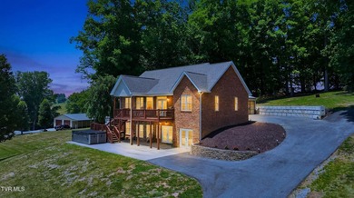 Luxury lake living meets breathtaking mountain views in this - photo 2