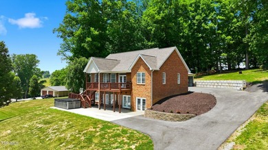 Luxury lake living meets breathtaking mountain views in this - photo 4