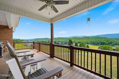 Luxury lake living meets breathtaking mountain views in this - photo 8
