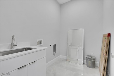 This beautiful new-construction custom home is located on a - photo 24