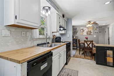 Beautifully maintained 3 bedroom, 2 bath ranch featuring an open - photo 12