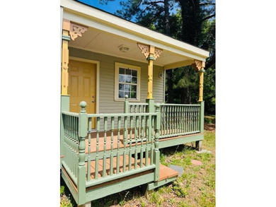 This house gives off the cozy cottage feeling. Lots of recent - photo 17