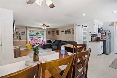 Beautifully maintained 3 bedroom, 2 bath ranch featuring an open - photo 18