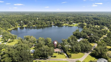 Lands Lake Home Active Under Contract in Wewahitchka Florida