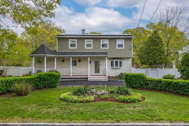 Welcome to this spacious expanded Colonial set on a beautifully - photo 1