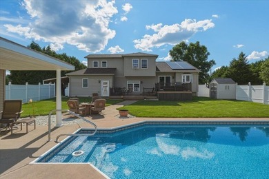 Set on 1.17 private acres in the heart of Grand Isle, this - photo 6