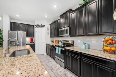 This stunning 2020 David Weekley home perfectly blends modern - photo 12