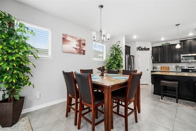 This stunning 2020 David Weekley home perfectly blends modern - photo 16