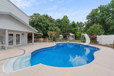 Nestled on nearly an acre in the established Pinewood community - photo 1