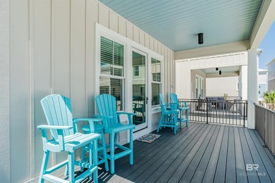 Coastal charm meets modern comfort in this stunning poolside - photo 4