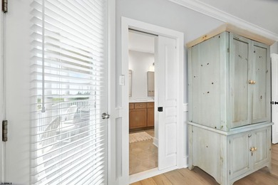 Stunning first-floor beachfront condo ideally positioned on a - photo 23