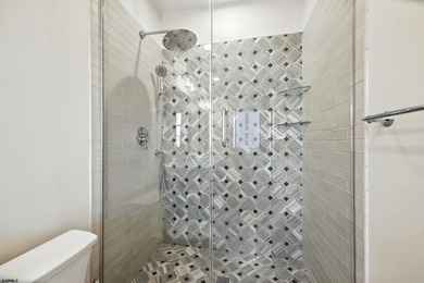 Stunning first-floor beachfront condo ideally positioned on a - photo 29