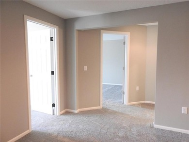 Detached townhome with pond views and a versatile 4-bedroom - photo 10